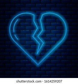 Glowing neon line Broken heart or divorce icon isolated on brick wall background. Love symbol. Valentines day.  Vector Illustration