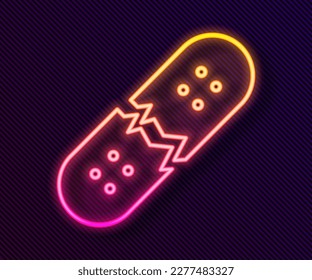 Glowing neon line Broken skateboard deck icon isolated on black background. Extreme sport. Sport equipment.  Vector