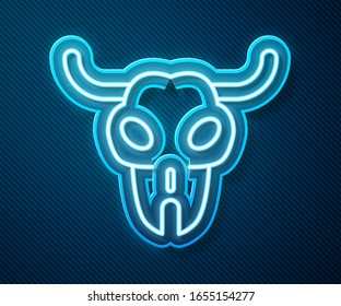Glowing neon line Buffalo skull icon isolated on blue background.  Vector Illustration