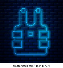 Glowing neon line Bulletproof vest for protection from bullets icon isolated on brick wall background. Body armor sign. Military clothing.  Vector Illustration