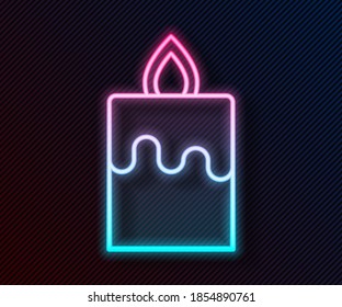 Glowing neon line Burning candle icon isolated on black background. Cylindrical aromatic candle stick with burning flame. Happy Halloween party.  Vector