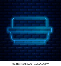 Glowing neon line Butter in a butter dish icon isolated on brick wall background. Butter brick on plate. Milk based product. Natural dairy product.  Vector