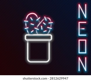 Glowing neon line Cactus peyote in pot icon isolated on black background. Plant growing in a pot. Potted plant sign. Colorful outline concept. Vector