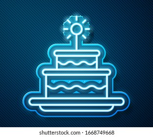 Glowing neon line Cake with burning candles icon isolated on blue background. Happy Birthday.  Vector Illustration