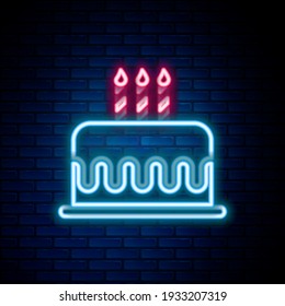 Glowing neon line Cake with burning candles icon isolated on brick wall background. Happy Birthday. Colorful outline concept. Vector