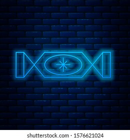 Glowing neon line Candy icon isolated on brick wall background. Merry Christmas and Happy New Year.  Vector Illustration