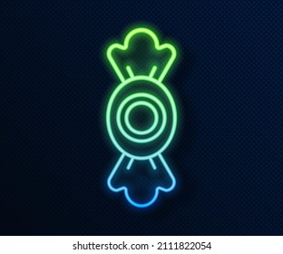 Glowing neon line Candy icon isolated on blue background.  Vector