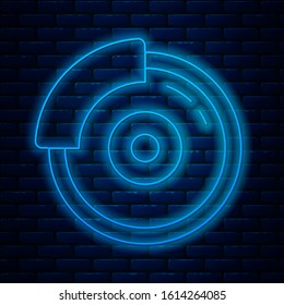 Glowing neon line Car brake disk with caliper icon isolated on brick wall background.  Vector Illustration