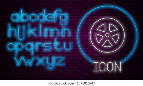 Glowing neon line Car wheel icon isolated on brick wall background. Neon light alphabet. Vector Illustration