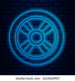 Glowing neon line Car wheel icon isolated on brick wall background.  Vector Illustration