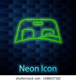 Glowing neon line Car windscreen icon isolated on brick wall background.  Vector Illustration