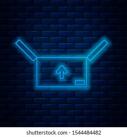 Glowing neon line Cardboard box with traffic symbol icon isolated on brick wall background. Box, package, parcel sign. Delivery, transportation and shipping.  Vector Illustration
