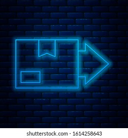 Glowing neon line Carton cardboard box icon isolated on brick wall background. Box, package, parcel sign. Delivery and packaging.  Vector Illustration