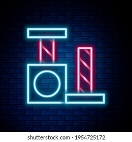 Glowing neon line Cat scratching post with toy icon isolated on brick wall background. Colorful outline concept. Vector