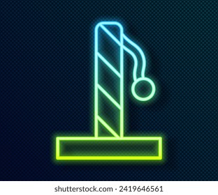 Glowing neon line Cat scratching post with toy icon isolated on black background.  Vector