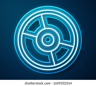 Glowing neon line CD or DVD disk icon isolated on blue background. Compact disc sign.  Vector Illustration
