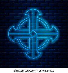 Glowing neon line Celtic cross icon isolated on brick wall background. Happy Saint Patricks day.  Vector Illustration