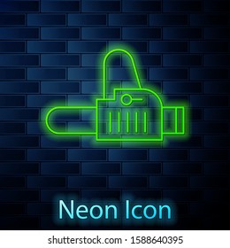 Glowing neon line Chainsaw icon isolated on brick wall background.  Vector Illustration