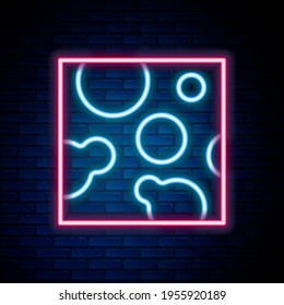 Glowing neon line Cheese icon isolated on brick wall background. Colorful outline concept. Vector
