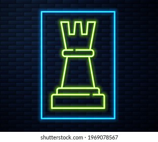 Glowing neon line Chess icon isolated on brick wall background. Business strategy. Game, management, finance.  Vector
