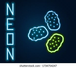 Glowing neon line Chicken nuggets icon isolated on black background. Colorful outline concept. Vector Illustration