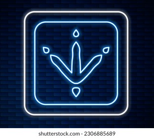 Glowing neon line Chicken paw footprint icon isolated on brick wall background. Rooster stamp.  Vector