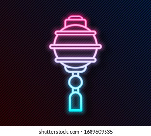 Glowing neon line Chinese paper lantern icon isolated on black background.  Vector Illustration