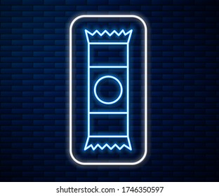Glowing neon line Chocolate bar icon isolated on brick wall background.  Vector Illustration