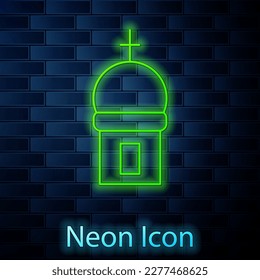 Glowing neon line Christian church tower icon isolated on brick wall background. Religion of church.  Vector