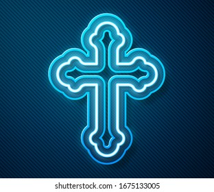 Glowing neon line Christian cross icon isolated on blue background. Church cross.  Vector Illustration