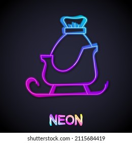 Glowing neon line Christmas santa claus sleigh with sack bag icon isolated on black background. Merry Christmas and Happy New Year.  Vector