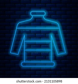 Glowing neon line Christmas sweater with norwegian ornaments and holidays decorations icon isolated on brick wall background. Knitted winter jumper.  Vector