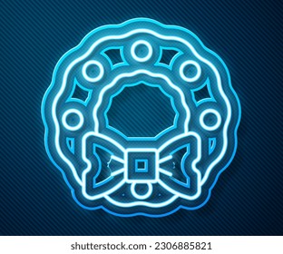 Glowing neon line Christmas wreath icon isolated on blue background. Merry Christmas and Happy New Year.  Vector