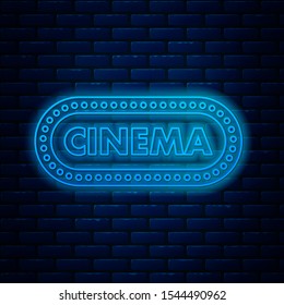 Glowing neon line Cinema poster design template icon isolated on brick wall background. Movie time concept banner design.  Vector Illustration