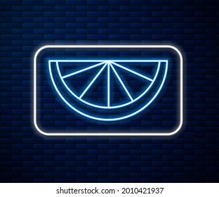 Glowing neon line Citrus fruit icon isolated on brick wall background. Orange in a cut. Healthy lifestyle.  Vector Illustration