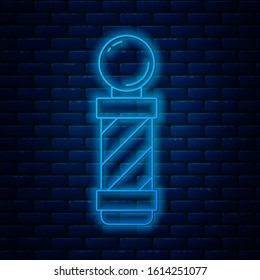 Glowing neon line Classic Barber shop pole icon isolated on brick wall background. Barbershop pole symbol.  Vector Illustration