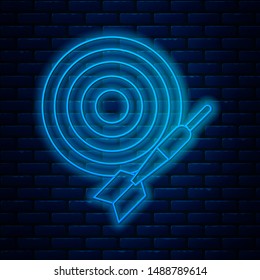 Glowing neon line Classic dart board and arrow icon isolated on brick wall background. Dartboard sign. Game concept.  Vector Illustration