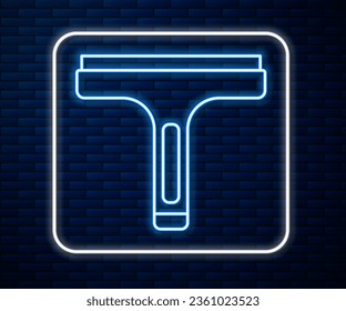 Glowing neon line Cleaning service with of rubber cleaner for windows icon isolated on brick wall background. Squeegee, scraper, wiper.  Vector