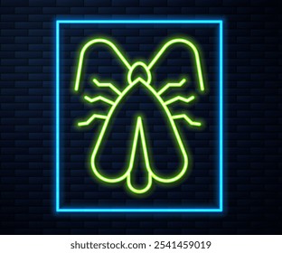 Glowing neon line Clothes moth icon isolated on brick wall background.  Vector