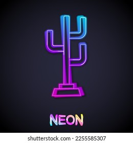 Glowing neon line Coat stand icon isolated on black background.  Vector