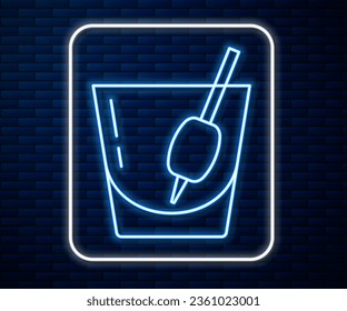 Glowing neon line Cocktail Bloody Mary icon isolated on brick wall background.  Vector