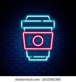 Glowing neon line Coffee cup to go icon isolated on brick wall background. Colorful outline concept. Vector