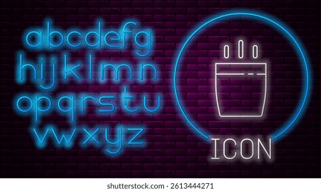 Glowing neon line Coffee cup icon isolated on brick wall background. Tea cup. Hot drink coffee. Neon light alphabet. Vector