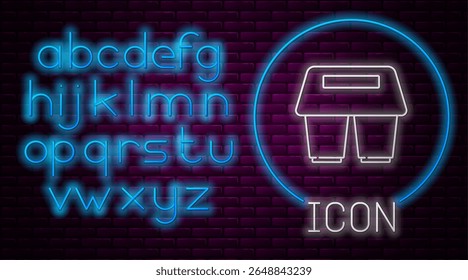 Glowing neon line Coffee cup to go icon isolated on brick wall background. Neon light alphabet. Vector