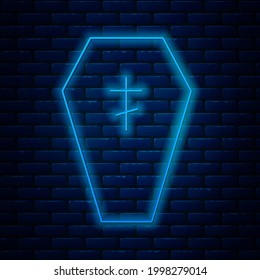 Glowing neon line Coffin with christian cross icon isolated on brick wall background. Happy Halloween party.  Vector