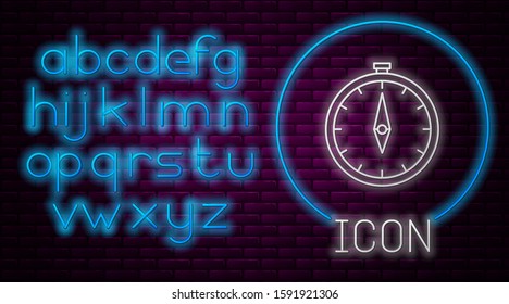 Glowing neon line Compass icon isolated on brick wall background. Windrose navigation symbol. Wind rose sign. Neon light alphabet. Vector Illustration