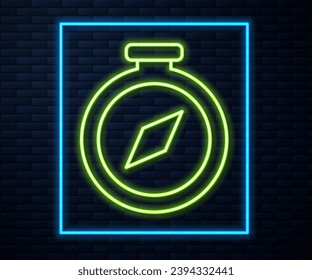 Icono de la brújula de neón brillante aislado en el fondo de la pared de ladrillo. Símbolo de navegación de Windrose. Signo de rosa eólica.  Vector
