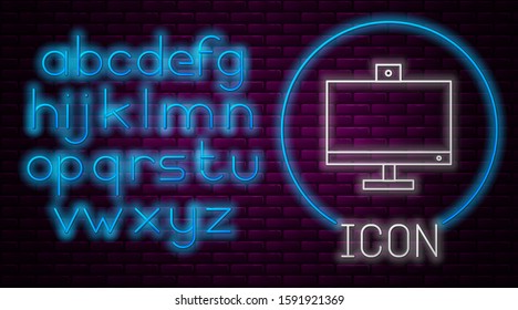 Glowing neon line Computer monitor icon isolated on brick wall background. PC component sign. Neon light alphabet. Vector Illustration