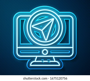 Glowing neon line Computer monitor and folded map with location marker icon isolated on blue background.  Vector Illustration
