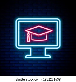 Glowing neon line Computer monitor with graduation cap icon isolated on brick wall background. Online learning or e-learning concept. Internet knowledge. Colorful outline concept. Vector
